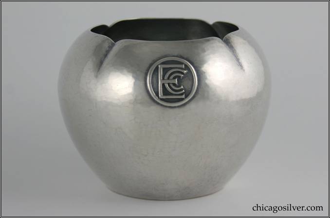 Kalo bowl or vase / trophy, with flat bottom and sides that bulge out and then taper up to four small flutes at the top.  