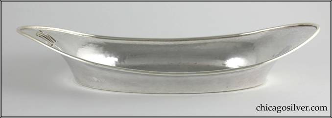 Kalo bowl or bread tray, oval with flat bottom and broad flaring edge, with ends higher than the middle, heavy applied wire on rim