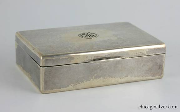 Kalo box, cigarette, rectangular with hinged cover and slightly rounded corners.  Applied "McK" mono in circular cartouche on cover.
