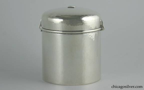 Kalo box in the form of an air-tight canister, silver, cylindrical, with snug, domed lid that centers an applied "2" numeral.  