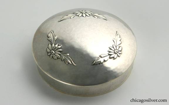 Kalo box, small covered, hammered surface with domed cover, which has chased and repousse floral decorations in circular pattern.   