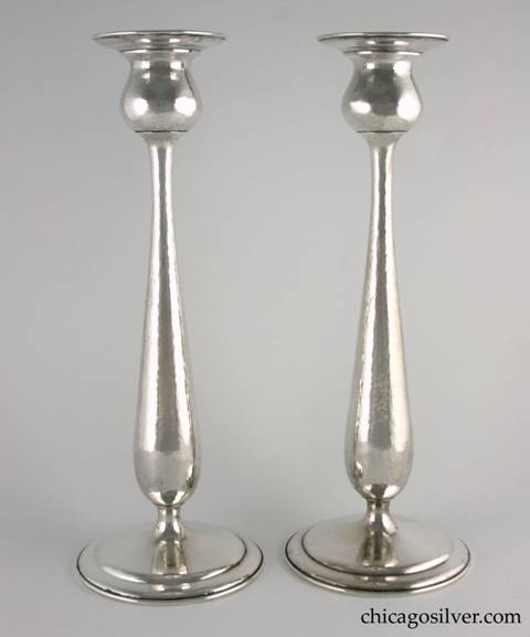 Kalo candlesticks, tall, pair (2), monumental, with stepped circular foot, in tulip form with broad flange at top. Nicely hammered.  14-1/8" H and 5-1/4" W across base and 3-7/16" W across top.  Marked:  STERLING / HAND WROUGHT / AT / THE KALO SHOP / G152H