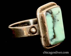 Forest Craft Guild ring, silver, with rectangular frame centering a rectangular veined green-blue laramar stone, with small beads at the sides.