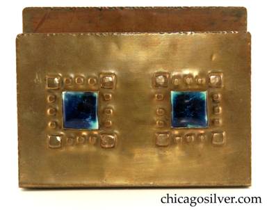 Forest Craft Guild letter holder, brass, with two square blue inset tiles each surrounded by repousse pattern of four larger squares at the corners of the tiles, with three smaller squares in between forming a border.  Rounded corners and hand-worked edges.