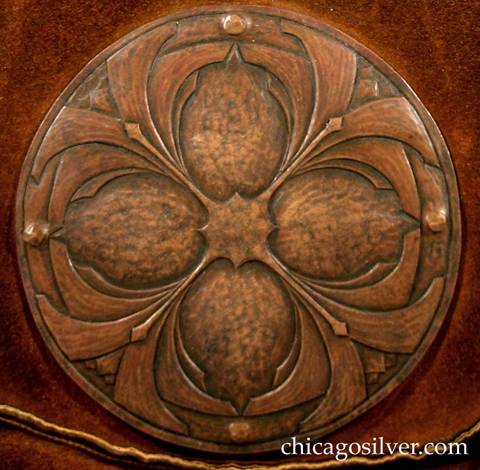 Forest Craft Guild handbag, detail, showing extensive detailed repousse geometric decoration.