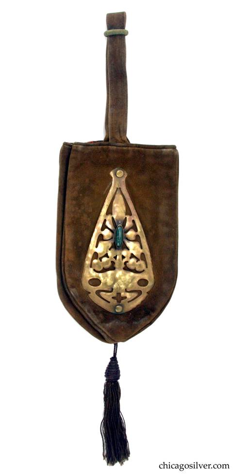 Forest Craft Guild handbag, ooze leather, lined, with large riveted and saw-pierced brass hardware on both sides, each centering a green oval bezel-set cabochon bloodstone.  Long central handle on top and silk tassel on bottom.