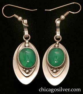 Laurence Foss earrings, pair (2), drop, for pierced ears, oval form, each with a smaller applied oval centering an oval bezel-set cabochon chrysoprase stone with bead ornament top and bottom.  S-shaped strap wire link through one end of a loop at the top connected to a hook at the top with spiraling wire and bead detail.  