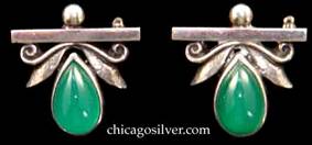 Laurence Foss pins, small, pair, teardrop-shaped green bezel-set stones below hammered leaves and scroll decoration.