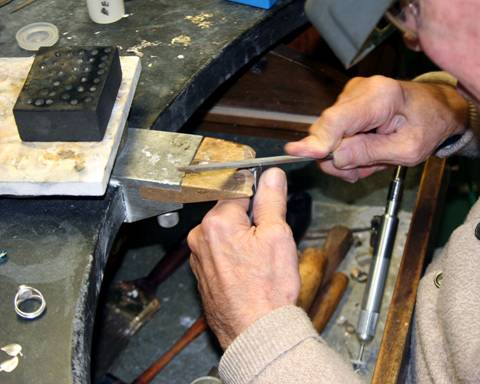 Laurence Foss at his workbench