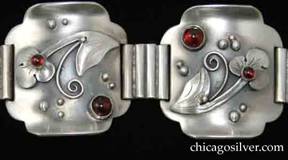Detail from Laurence Foss bracelet, link, with garnets.   