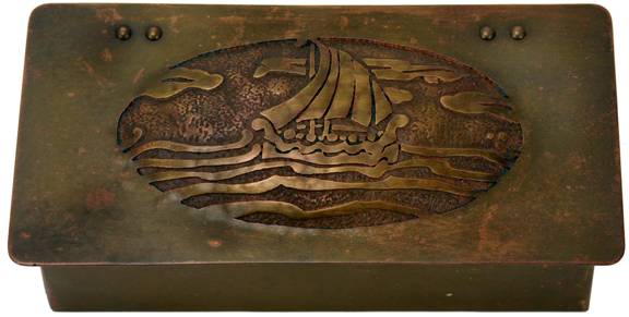 Frost brass cigarette box with hinged lid and hand-worked and acid-etched decoration of ship at sea.