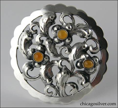 Yngve Olsson round pin with amber stones