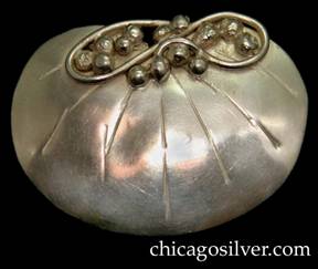 Mary Gage dress clip, oval, lily-pad form, with freeform pattern of beads and vines above a chased pattern of veins