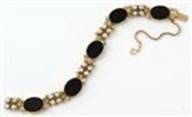 Rogers gold and onyx bracelet
