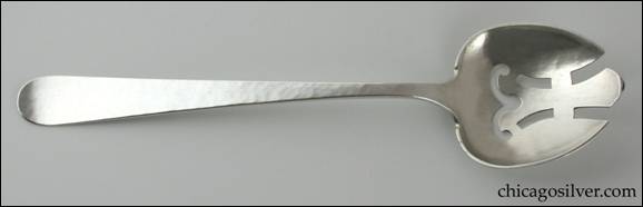 Hanck serving spoon with geometric pierced end.