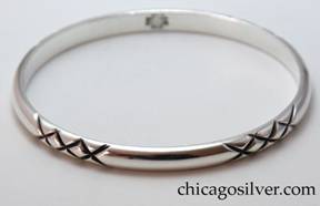 Kalo bracelet, bangle, with four repeated design elements of three Xs
