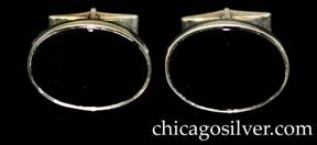 Kalo cufflinks, pair (2), oval, centering bezel set oval onyx stones, hinged links at back.