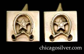 Kalo cufflinks, pair (2), ), square, each with applied decoration of upturned horseshoe with interior chased star, and connected stirrups at top.  Probably a custom order.