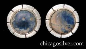 Kalo earrings, pair, screw backs, round with eight deeply chased lines radiating out from bezel on wide flat edge, centering round blue-white cabochon bezel-set stone.
