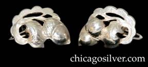 Kalo earrings, pair, screw backs.  Cutout design of oak leaf and acorn design on curving scalloped frame.