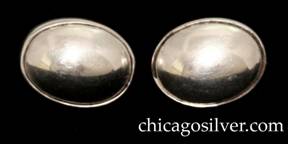 Kalo earrings, pair, screw backs.  Oval, with bezel-set silver domes.  