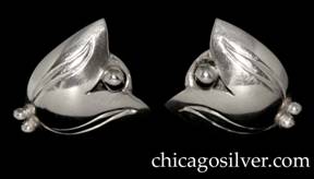 Kalo earrings, pair, screw backs, shield-shaped, in the form of two stylized leaves or petals with a small silver bead at the top between them and two silver beads at the bottom.  Curving chased vein design on each side.  