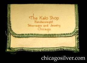 Kalo cloth jewelry bag, with green stitching and two pockets