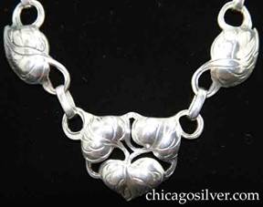 Kalo necklace / choker composed of 11 links, in the form of chased and repousse leaves connected by pierced vines and stems, with other links each made of a single leaf