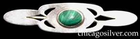 Kalo pin, bar, with malachite stone.  Rectangular body with curving corners and cutouts centering oval bezel-set malachite stone, with two thin rounded ends.