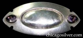 Kalo brooch, oval, heavy, with twin notches and bezel-set amethyst cabochons at each end, oval shaped insert at center