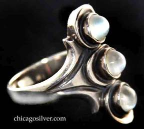Kalo ring, large and heavy, with three bezel-set moonstones in a straight row 