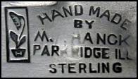M. W. Hanck mark with trademark flowerpot