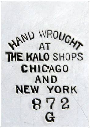 Where's the "STERLING" mark?  All Kalo silver items have the word STERLING at the top of the mark.  The craftsman signing this pitcher probably forgot to add it.  It's the only one like this we've seen.