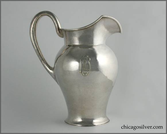 Kalo pitcher, water, vase form with raised spout and applied wire at rim, high looping hollow handle, applied interlocking RHB monogram.  Hammered surface.  7-1/2" H and 9-1/4" W.  STERLING / HAND WROUGHT / AT / THE KALO SHOP / L362 / 3-1/2 PINTS