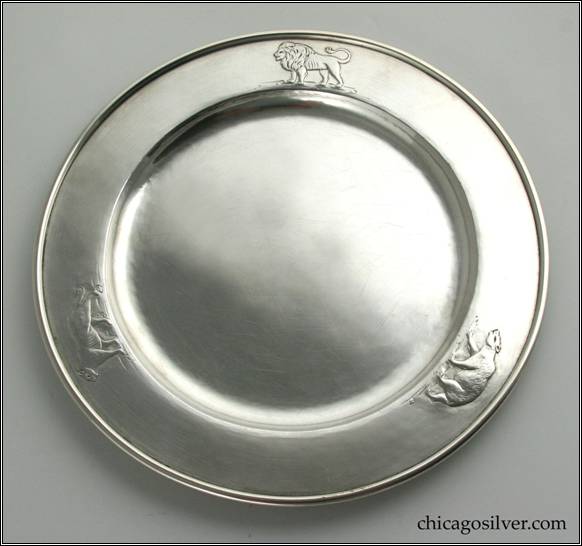 Kalo plate, child's, round, with three repouss animals (lion, cougar, polar bear) on flat raised edge with wire rim, engraved "Bobby's first birthday / from / Grandmother Reynolds" on bottom