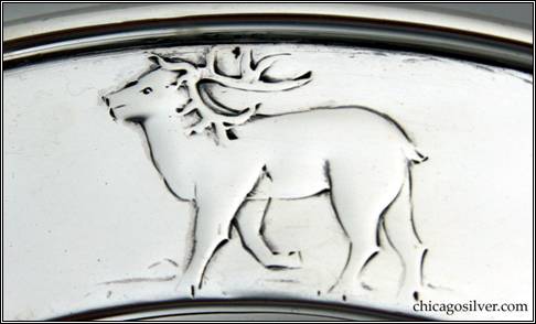Kalo plate, child's, round, with raised border, chased and repoussé design of reindeer, arctic fox, and polar bear -- detail