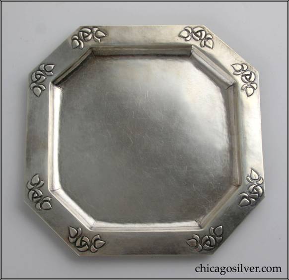 Kalo tray, octagonal, round, with flat bottom, alternating long and short sides and a slightly raised border with repousse Glasgow Rose design