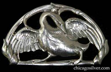 Peer Smed brooch / pin, oval with flat bottom, large and heavy, in the shape of a swan with outstretched wings on a cutout frame with floral decoration.  Nicely detailed chasing.