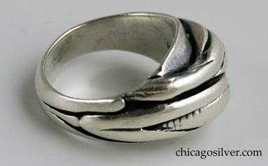 Peer Smed ring, thick and heavy for its size, composed of abstract undulating horizontal bands of stylized leaves