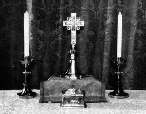 Ciborium in silver gilt by George E. Germer; altar cross and candlesticks in silver gilt designed by Ernest T. Jago, Goodhue Associates, executed by Arthur J. Stone for  George G. Booth Esq., Detroit
