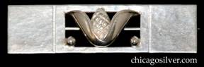 Brooch / pin, sterling, rectangular, centering very dimensional pinecone emerging from thick cuplike leaves or blossoms, inside rectangular cutout with silver beads at the lower corners.  Heavy.  Hammered surfaces.