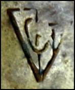 Unknown mark of overlapping letters inside triangle