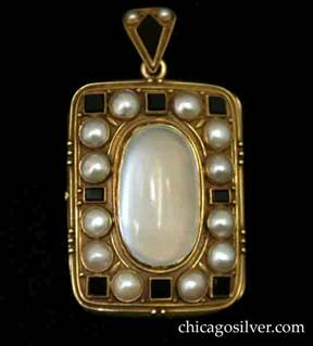 Locket, hand wrought in 14K gold with large central moonstone surrounded by 12 pearls alternating with 8 four-sided black onyx plaques. Applied bead and wire work.  Bale is decorated with diamond-shaped black onyx and two small seed pearls.  Excellent craftsmanship.  Heavy.