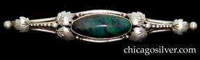 Brooch / pin, sterling, centering dark oval bezel-set turquoise or malachite stone with beads and chased leaves at the corners, on wire oval frame with  graduated row of beads and a chased leaf at each end, terminating with a larger bead.  
