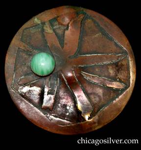 Pin, copper, round, with acid etched design and off-center round green cabochon bezel-set stone