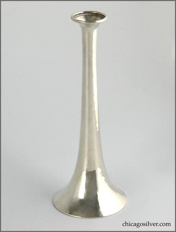 Kalo vase, bud, inverted trumpet form, with flat bottom, tapering neck, slightly flared top with wire applied to rim.  Elegant proportions, hammered surface.  Pristine condition.  2-5/8" W (at bottom) and 1-1/8" W (at top) and 6-3/4" H.  Marked:  STERLING / HANDWROUGHT / AT / THE KALO SHOP / M627