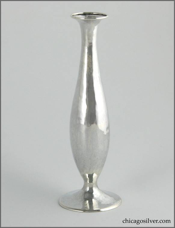Kalo vase, bud, small, on round base with a low bulge in the body and slight flare at the top.  Hammered surfaces. 5-1/2" H  and 1-7/8" W.  Marked:  STERLING / HAND WROUGHT / AT / THE KALO SHOPS / CHICAGO / AND / NEW YORK / 801