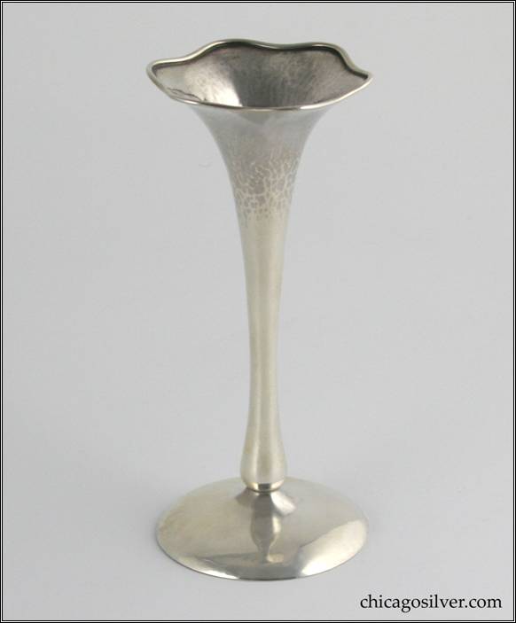 Kalo vase, bud, on broad base with flaring, trumpet-form body and ruffled rim with applied wire.  Hammered surface.  6" H and 2-5/8" W at base.  Marked:  HAND WROUGHT / AT / THE KALO SHOPS / CHICAGO / AND NEW YORK / STERLING / 416 / G